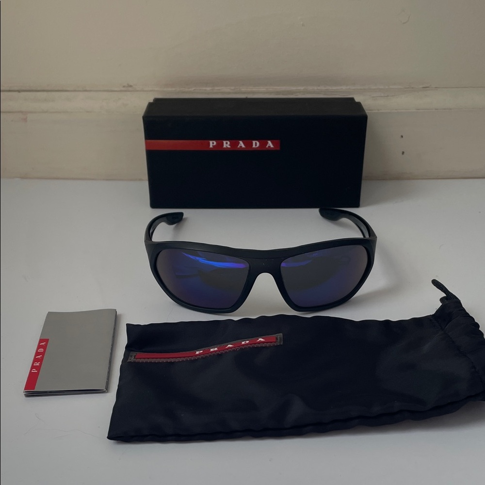 Prada sport Black and Blue Sunglasses 100% authentic made in Italy polarized